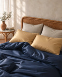 Chambre bohème avec linge de lit en satin de coton | Julie Lavarière